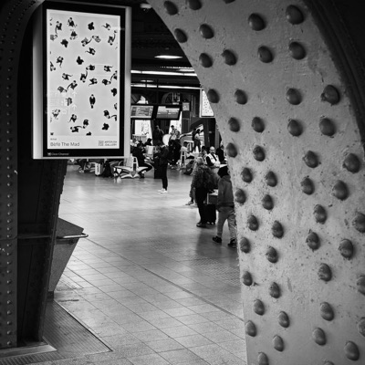 The work on a display in an arched passage